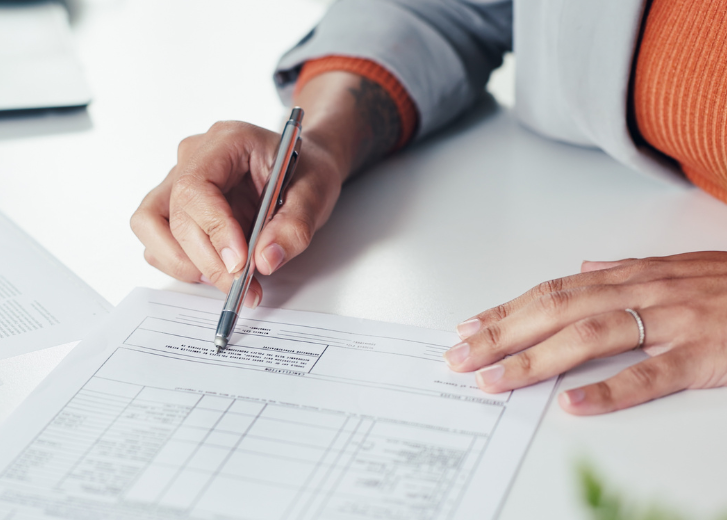 Financial advisor reviewing finance documents